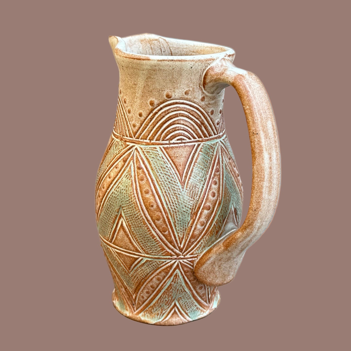 Small Carved Pitcher