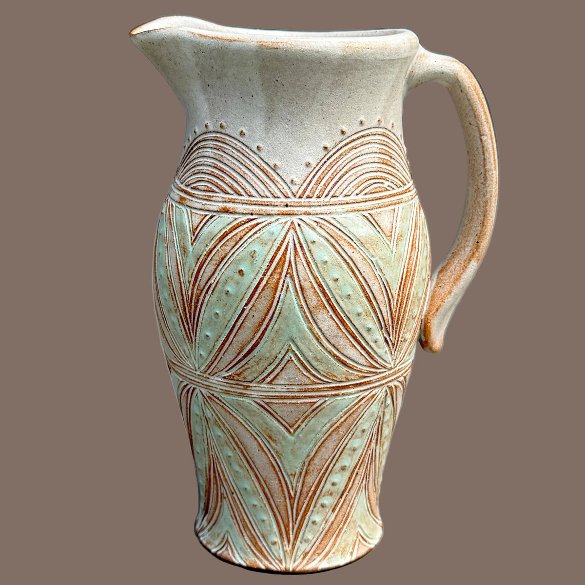 Carved Pitcher