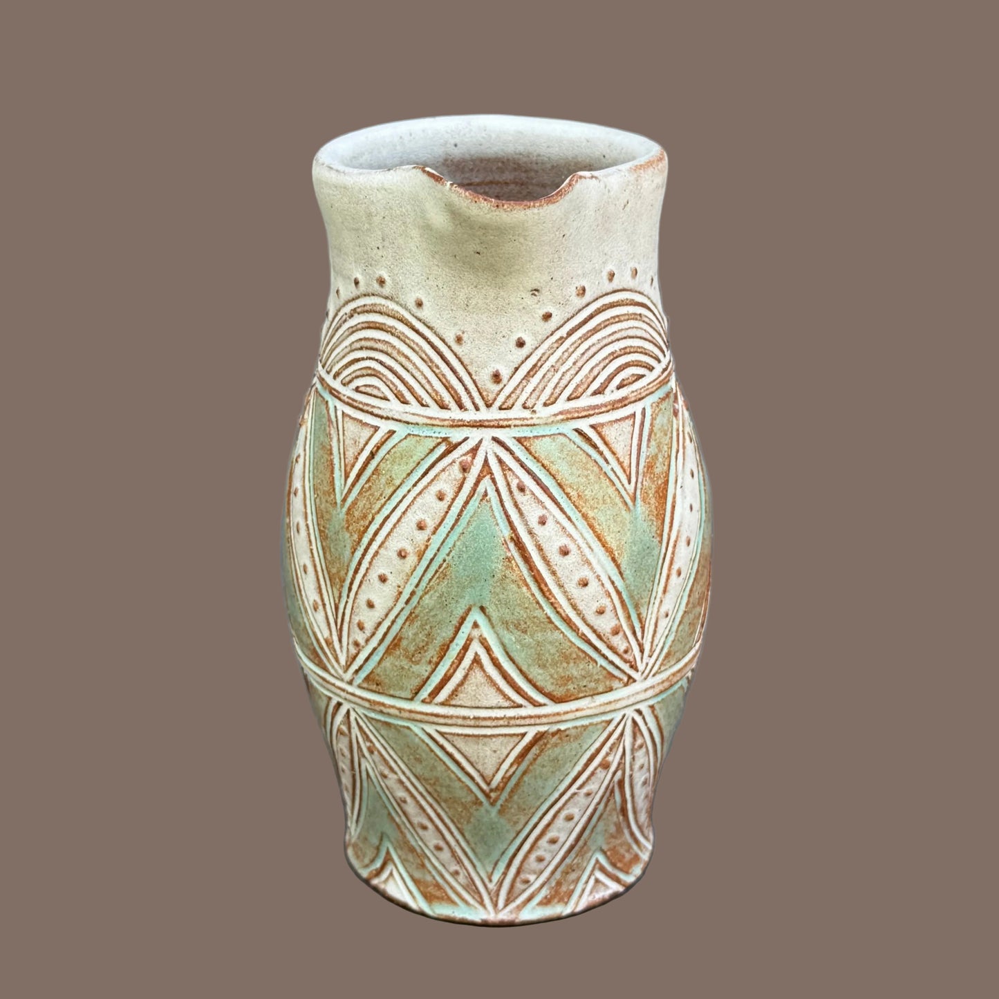 Small Carved Pitcher