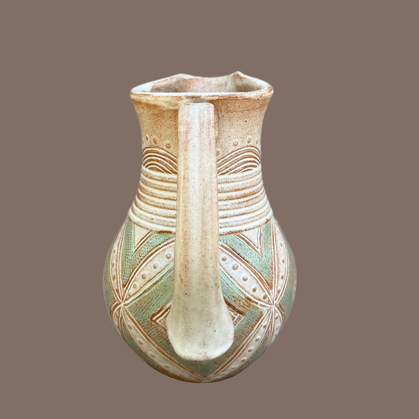 Small Carved Pitcher