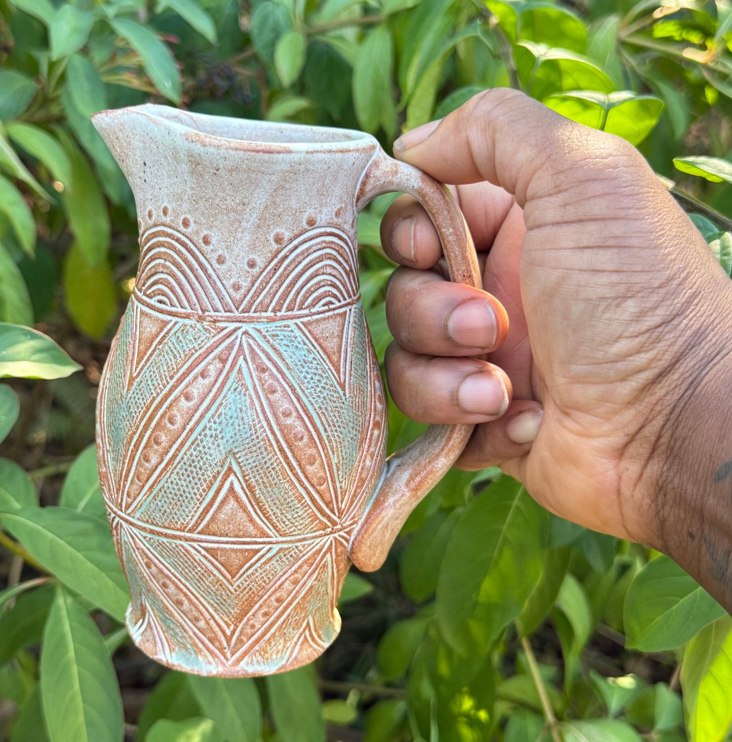 Small Carved Pitcher