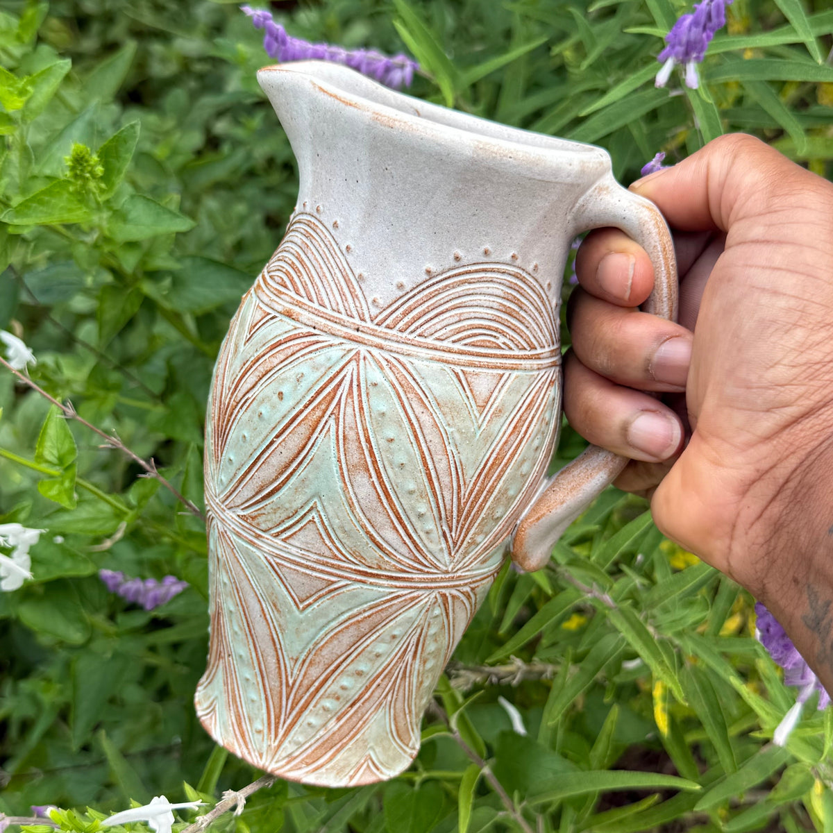 Carved Pitcher
