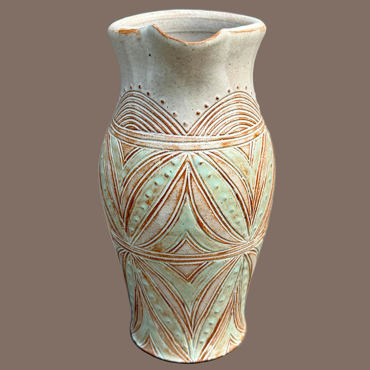 Carved Pitcher