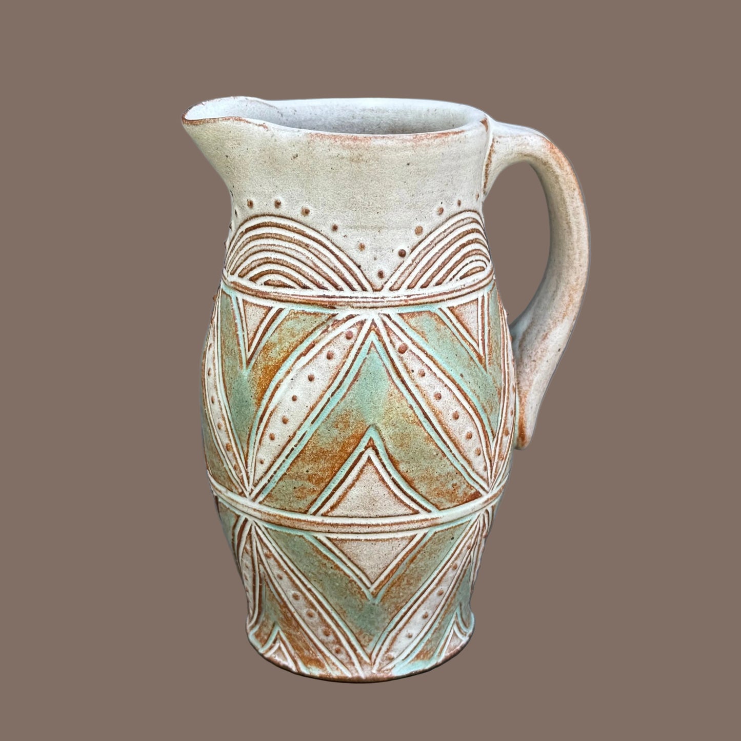 Small Carved Pitcher