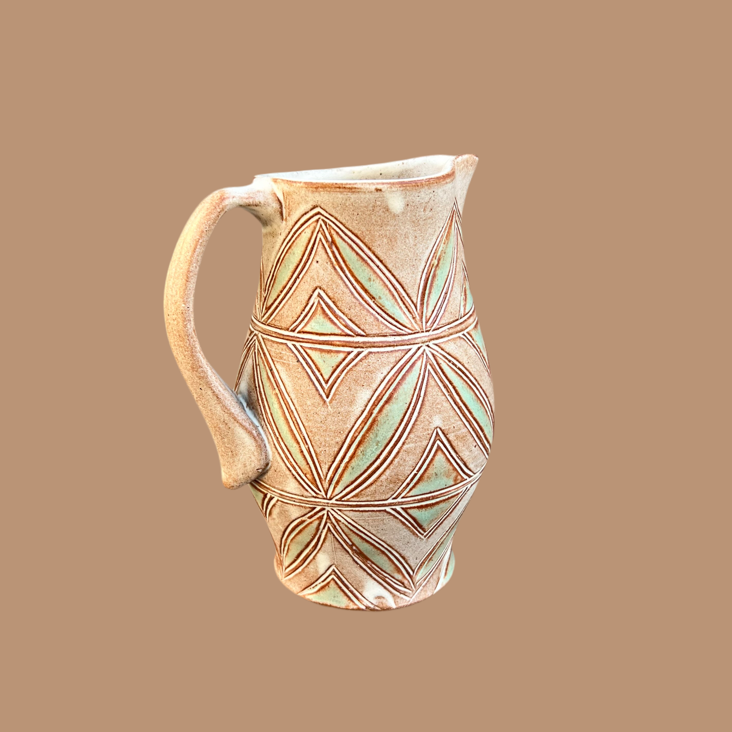 Small Carved Pitcher