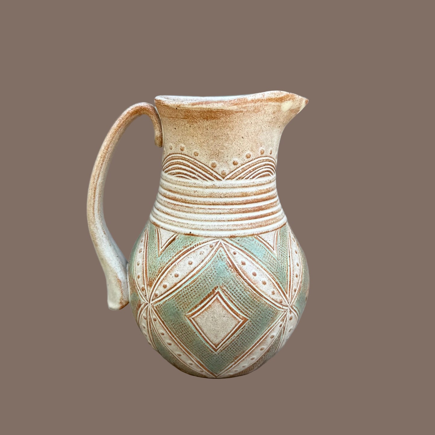 Small Carved Pitcher