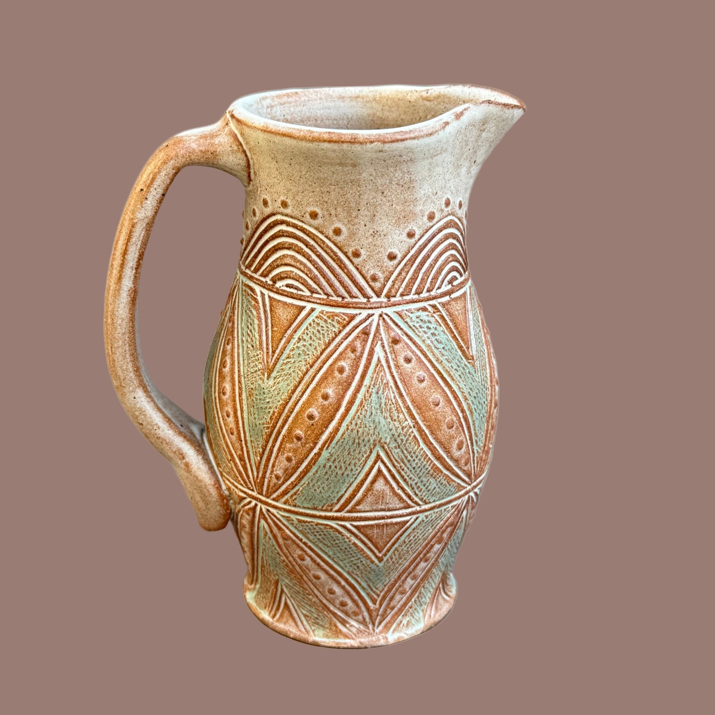 Small Carved Pitcher