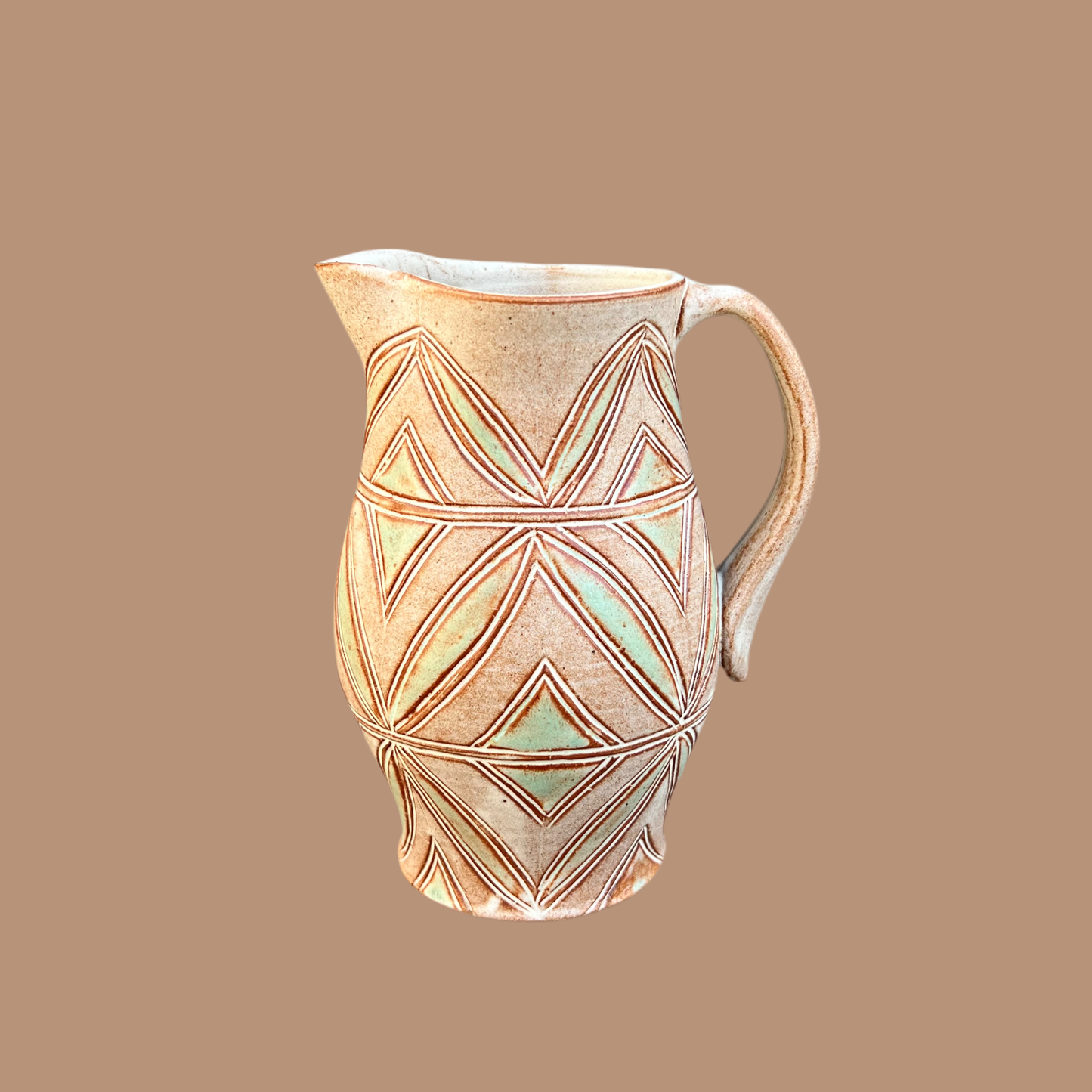 Small Carved Pitcher