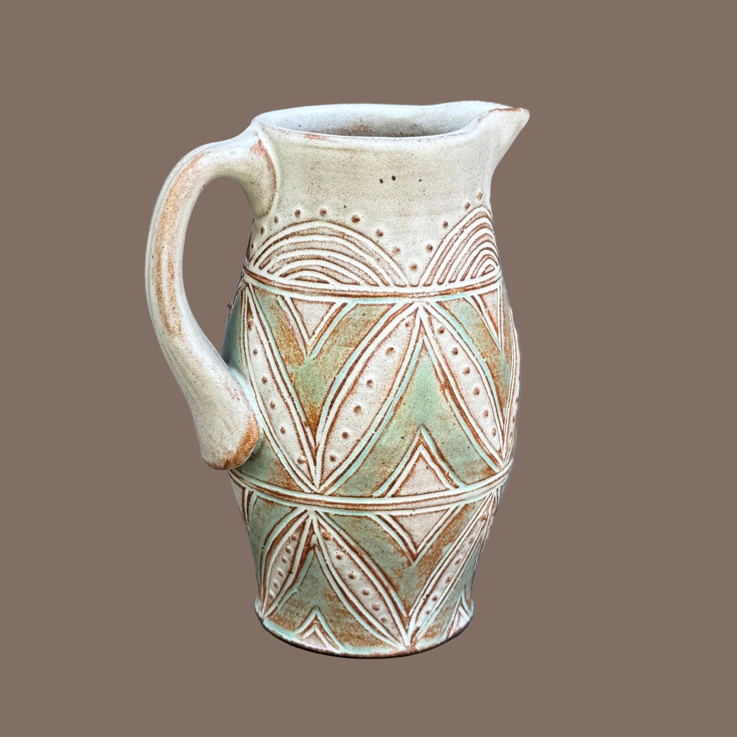 Small Carved Pitcher