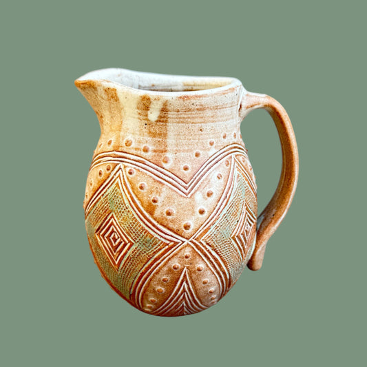 Small Carved Pitcher