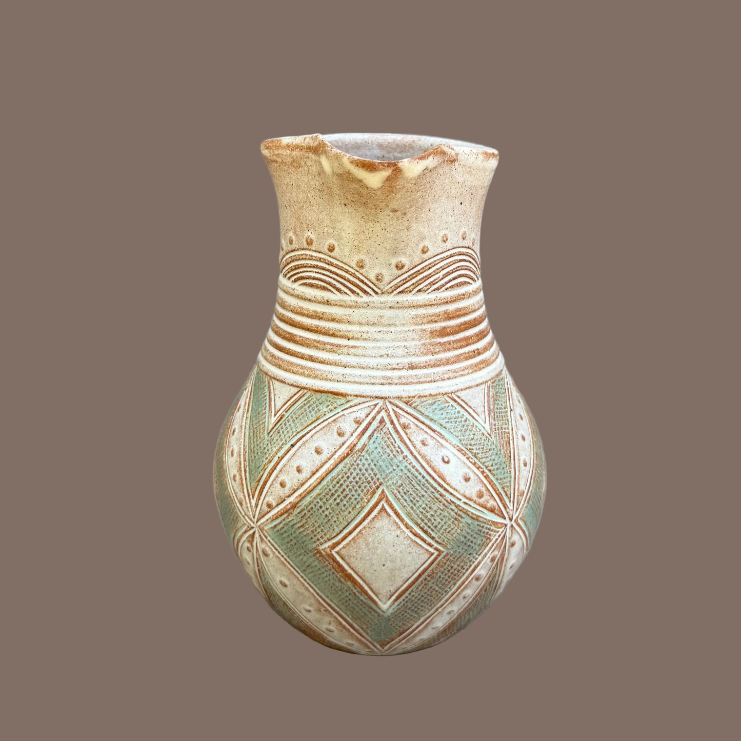 Small Carved Pitcher